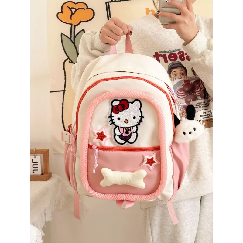 Sanrio Hello Kitty Student Schoolbag, almofada de ombro fofa dos desenhos animados, mochila de grande capacidade, homens e mulheres, nova