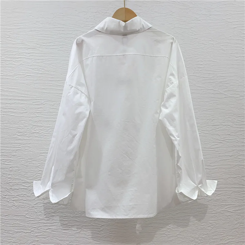 Chemise à manches longues pour femmes, Simple, couleur unie, mode européenne, nouveau, ample, amincissant, nœud asymétrique, amour, printemps, 2022