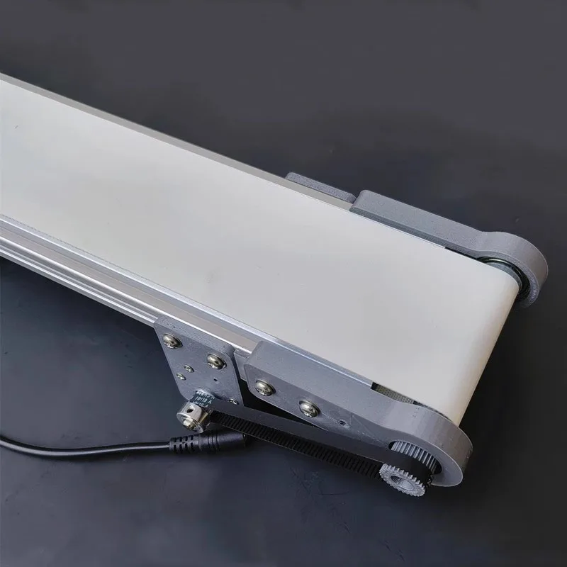 

DIY elevator model friction experimental device 10x50CM mini electric desktop conveyor belt speed adjustable 0-116RPM white belt