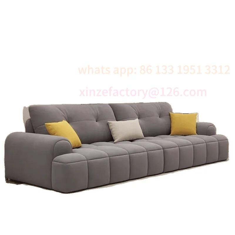 

Cream wind puff fabric sofa straight row small apartment living room cat claws simple and modern