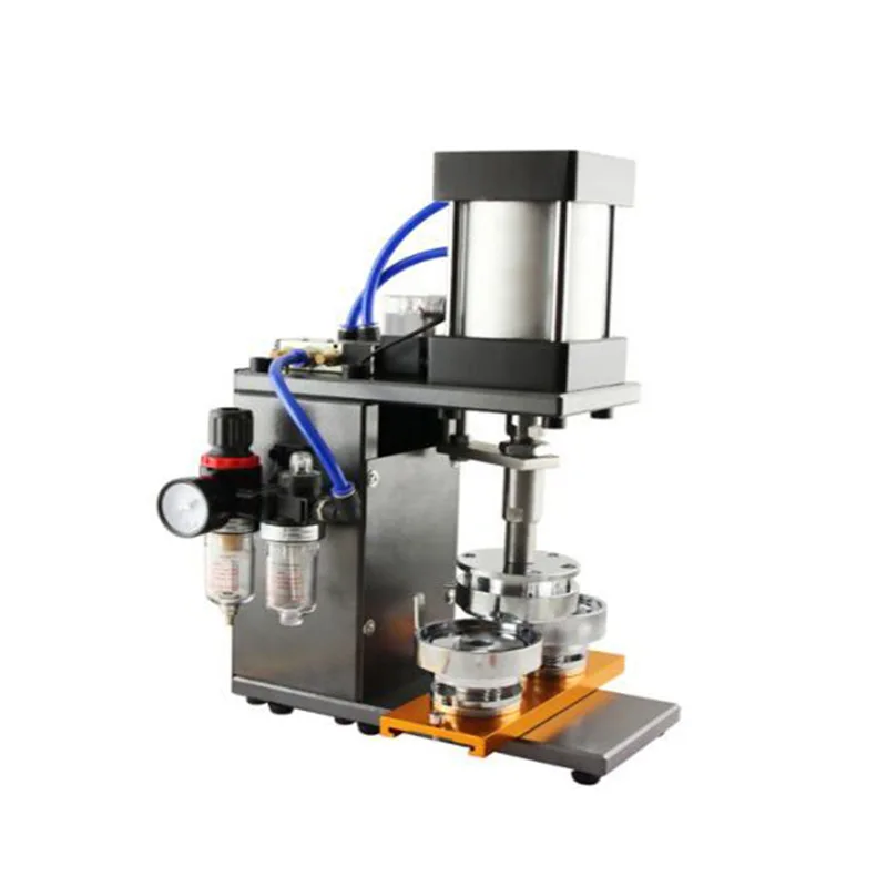 All automatic, pneumatic badge machine