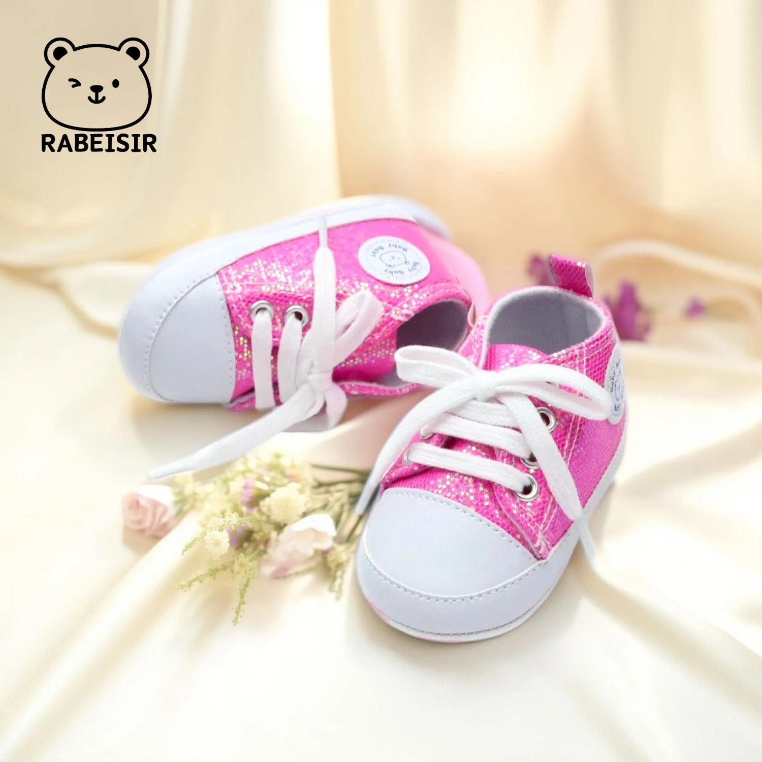 รองเท้าผ้าใบสําหรับบุรุษและสตรีสําหรับทารกอายุ 0-18 เดือน พื้นนุ่มระบายอากาศสไตล์เลื่อมกันลื่น