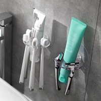 Bathroom Storage Rack Self Adhesive Toothbrush Holder Toothpaste Dispenser Shaver Organizer Razor Stand Home Gadgets