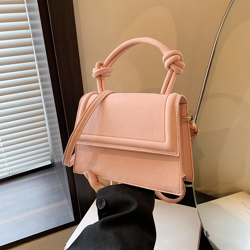 A stylish solid color PU material women's shoulder bag handbag, a variety of macaron colors, delicate and small, new