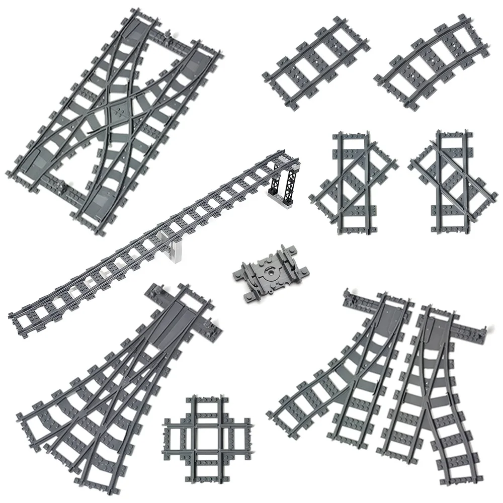 

Городские поезда Гибкие направляющие с раздвоенными прямыми изогнутыми мягкими рельсами Трековый переключатель Строительный блок Кирпичи Дети DIY Высокотехнологичная креативная игрушка