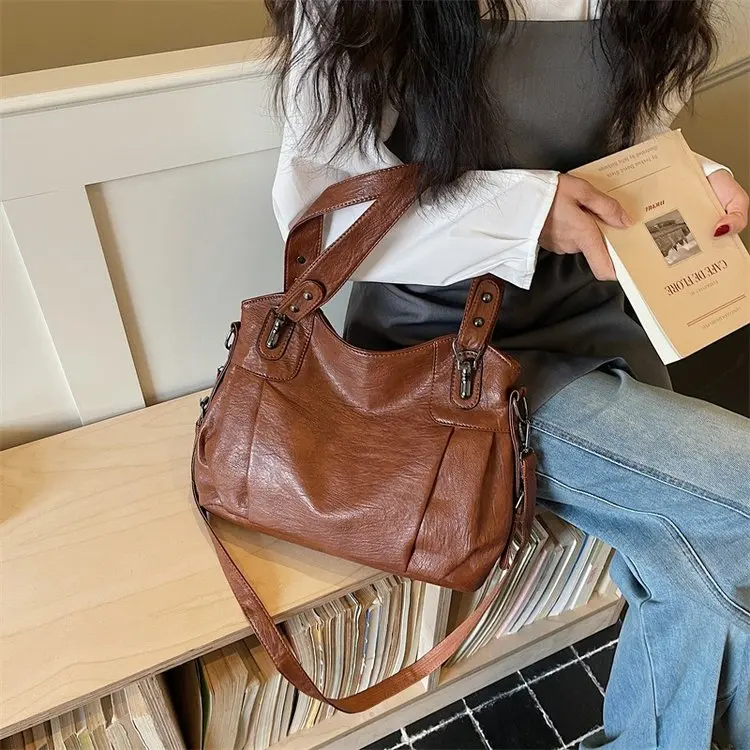 

Универсальная сумка для подгузников с элегантным цветом, подходящая для всех сезонов и различных стилей повседневной одежды.