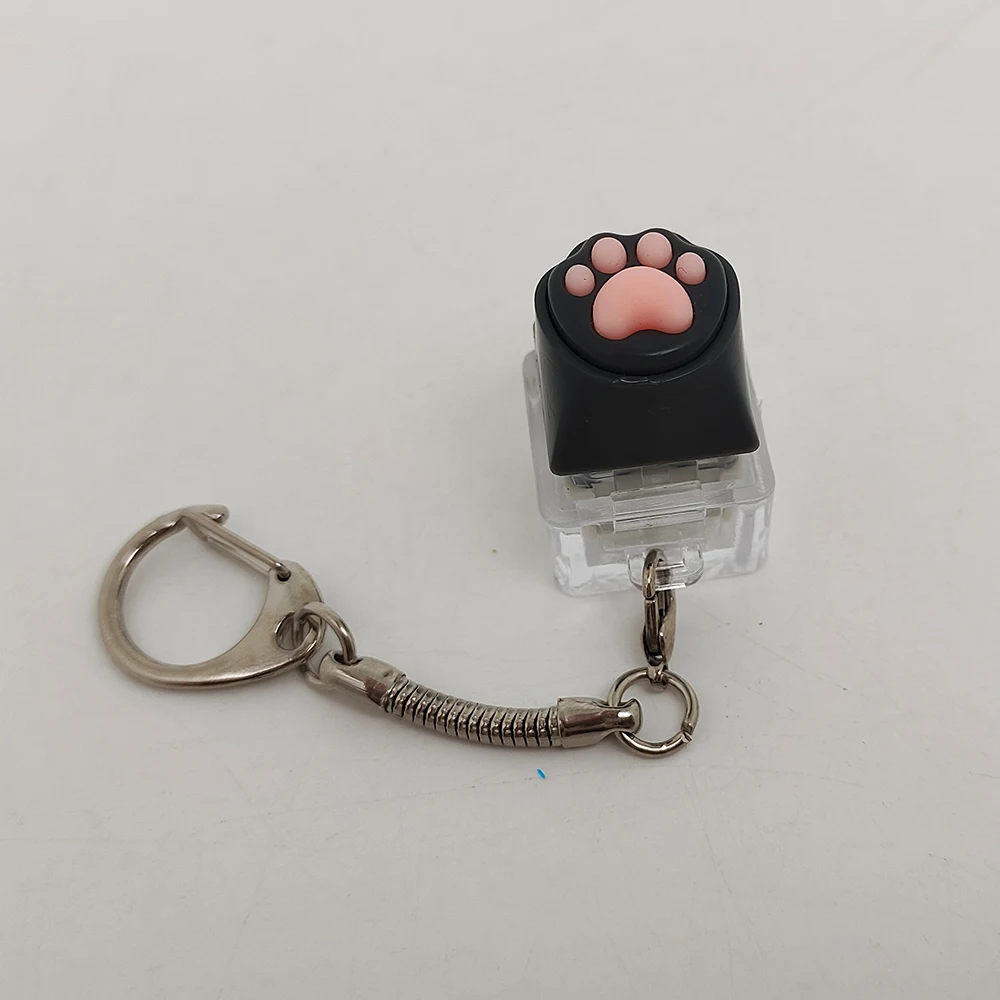 Chaveiro Squishy Patinha de Gato Fofa - Brinquedo de Silicone Macio para Alívio do Estresse, Decoração para Mochilas e Bolsas, Presente Antiestresse para Amantes de Gatos, Casais e Estudantes