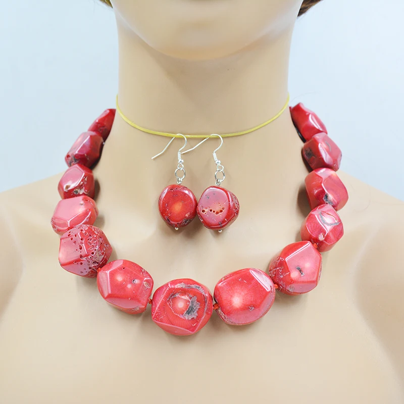 

22-25MM truly huge natural red coral necklace/earring set. Please note. There are very obvious flaws 20"