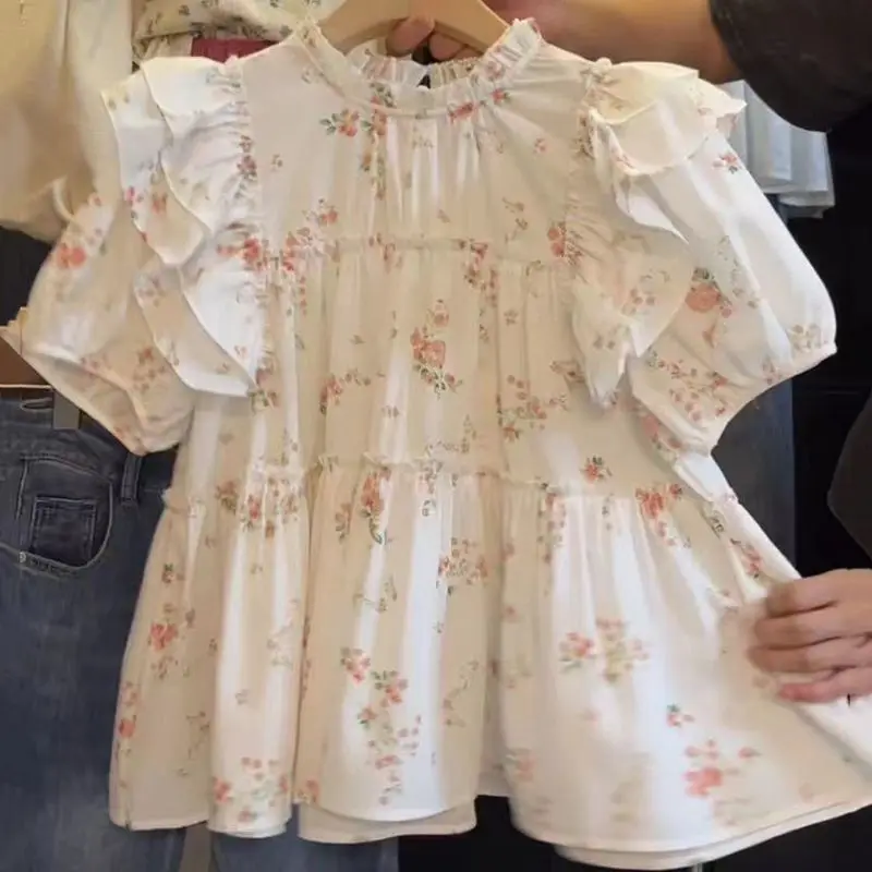 

Женская летняя модная тенденция с принтом, круглым вырезом, пышными рукавами, женская одежда, простая универсальная хлопковая одежда с цветочным принтом и оборками, с коротким рукавом