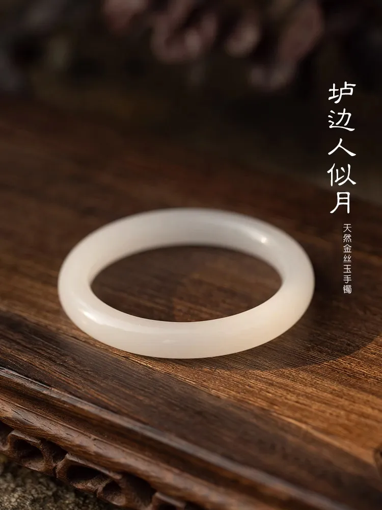

Xinjiang natural gold silk jade bracelet female beauty strip ice suet white jade