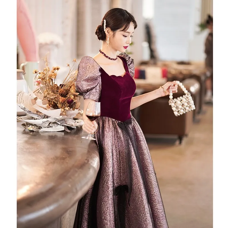 Wine red light luxury annual meeting presided over the test performance long dress