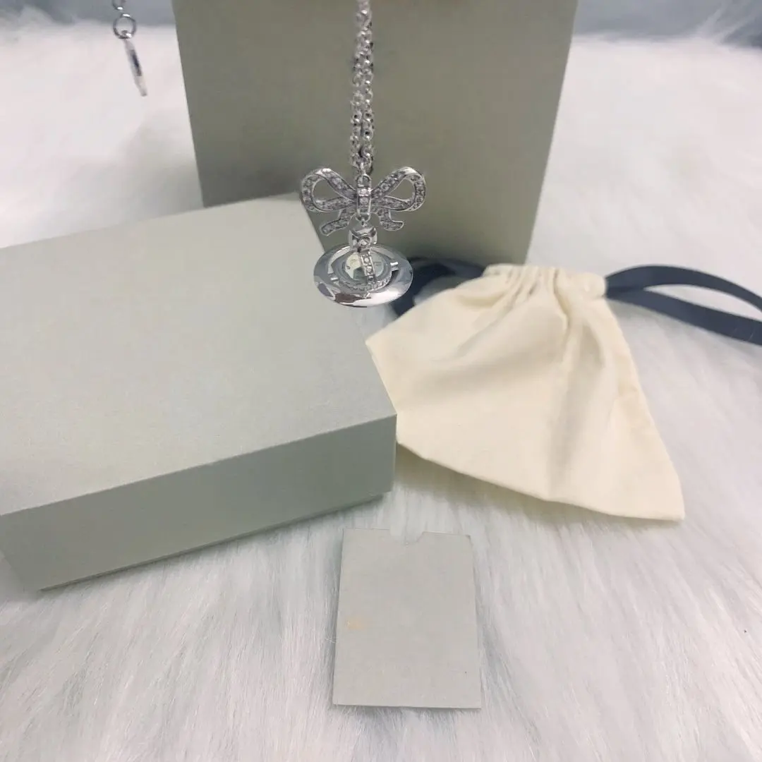 S925 فضة الأبيض ضوء القمر القوس ستيريو زحل قلادة قلادة السيدات أنيقة رومانسية الملحقات