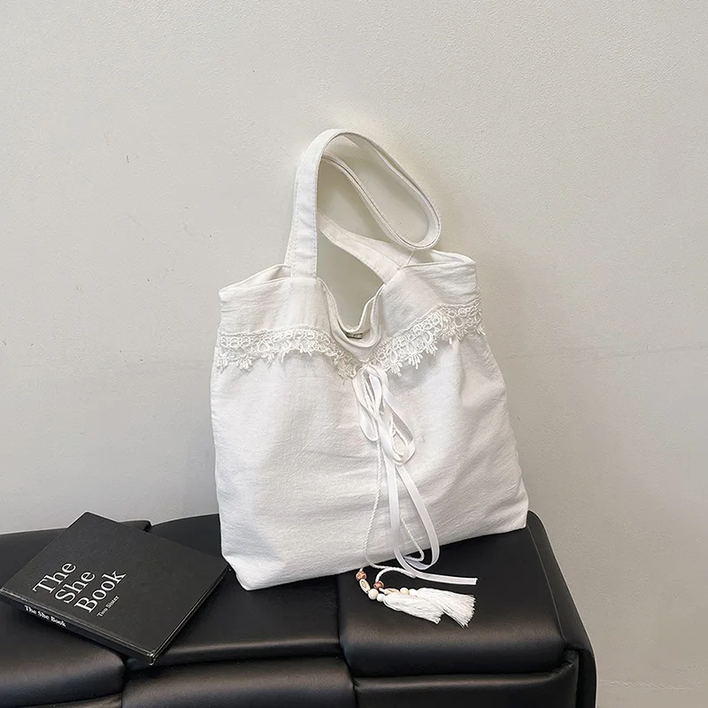 2025 arco arte renda bordado bolsa de ombro de grande capacidade elegante, versátil, bolsa de axilas de alta qualidade para mulheres