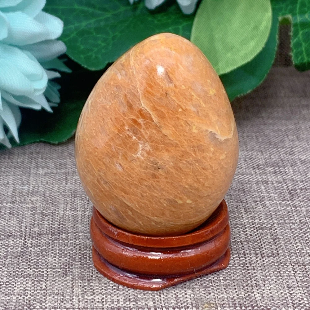 

Quartz Stone Natural Orange Moonstone Egg Crystal Palm Home Decorative Energy Gift