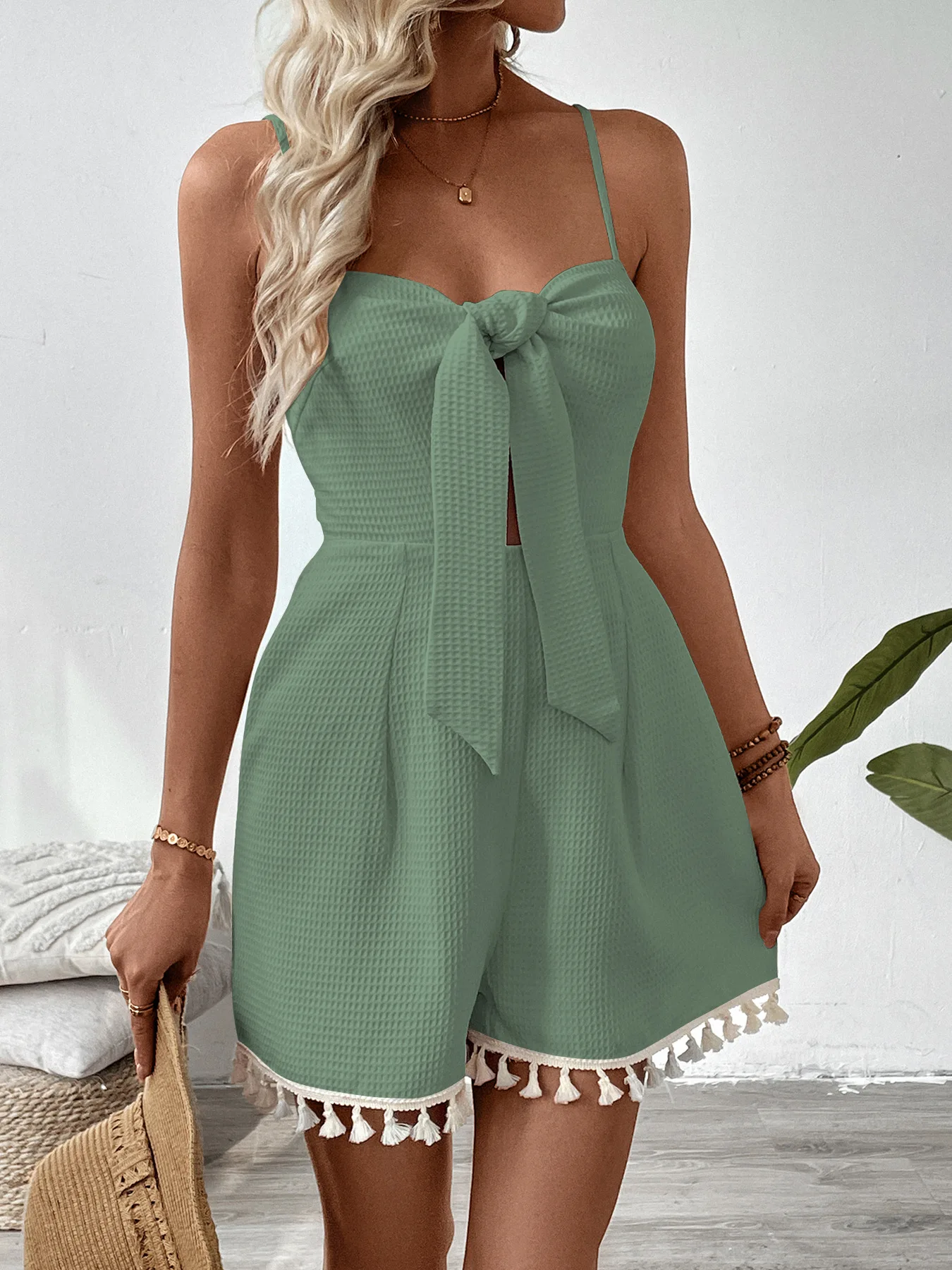Bestverkochte Europese en Amerikaanse lente-zomer getextureerde wafelpatroon effen kleur gepersonaliseerde jumpsuit shorts met franjes