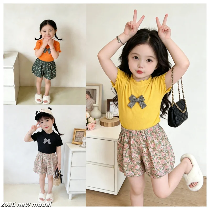 

Girls Suit2026New stylish summer children's short-sleeve with bow tieTT-shirt top and bud shorts two-piece set