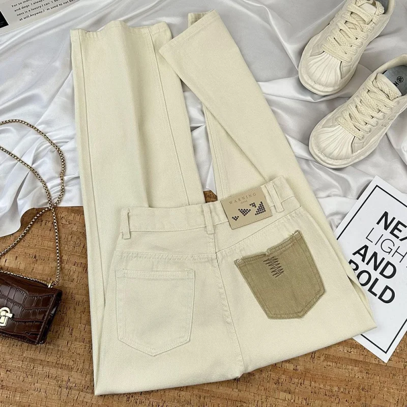 

Джинсовые рабочие брюки с высокой талией, стройнящие фигуру, с эффектным дизайном2025Свободные широкие брюки для женщин абрикосового цвета