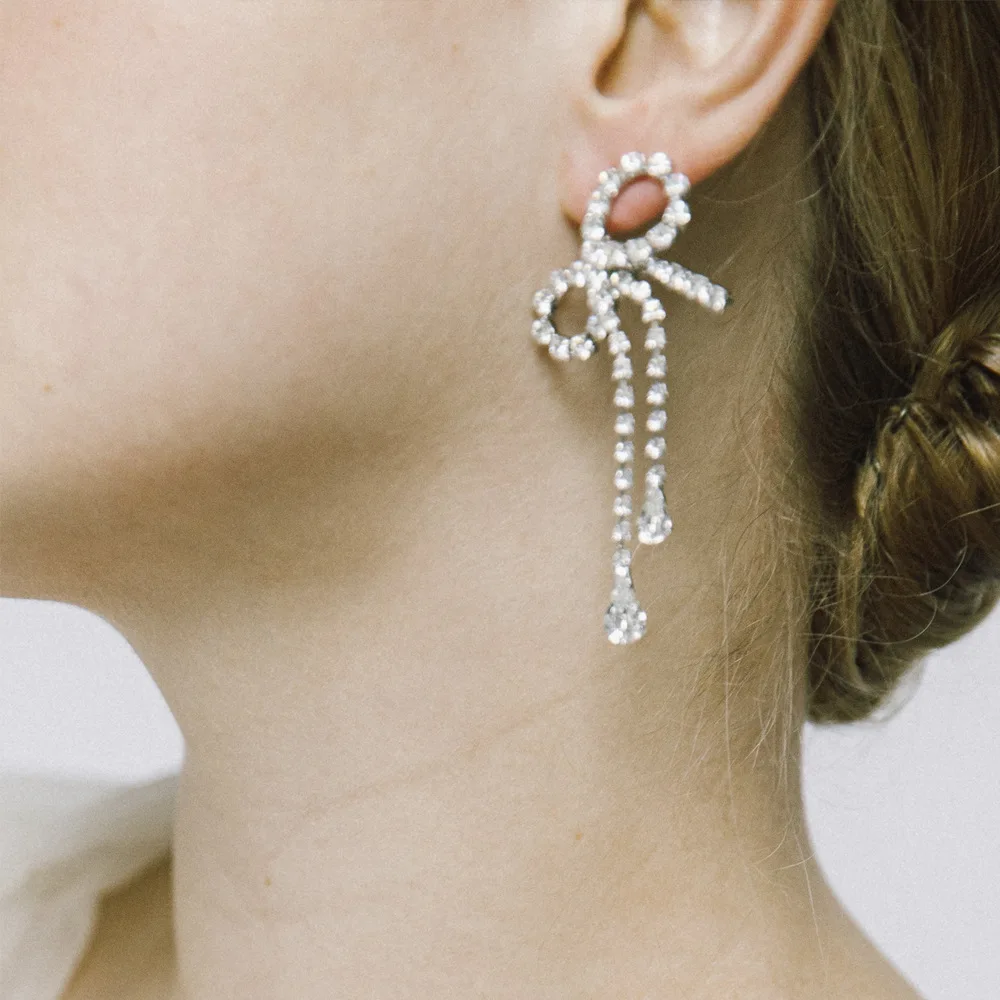 Cross-border fashion new models, exquisite fashion bow earrings temperament versatile pendant diamond earrings earrings