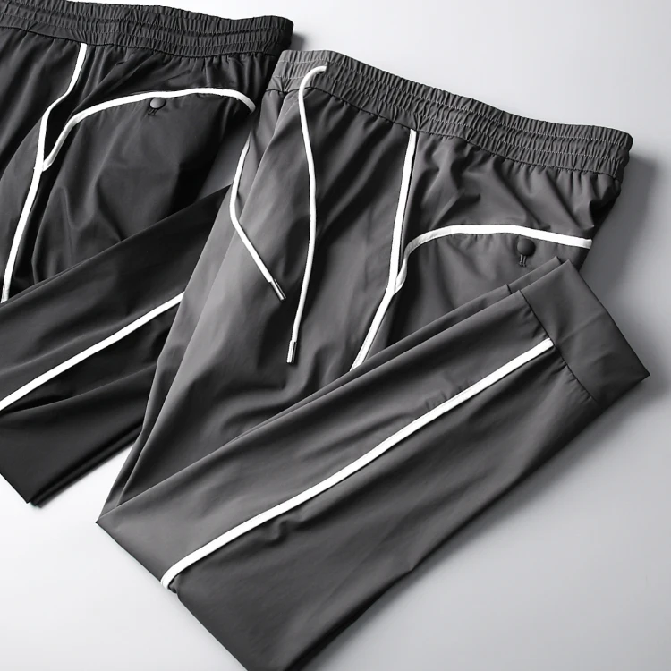 

Новые мужские спортивные повседневные брюки Slim Fit из легкой дышащей ткани без складок, весна-лето, с цветными вставками, для узкого стопы