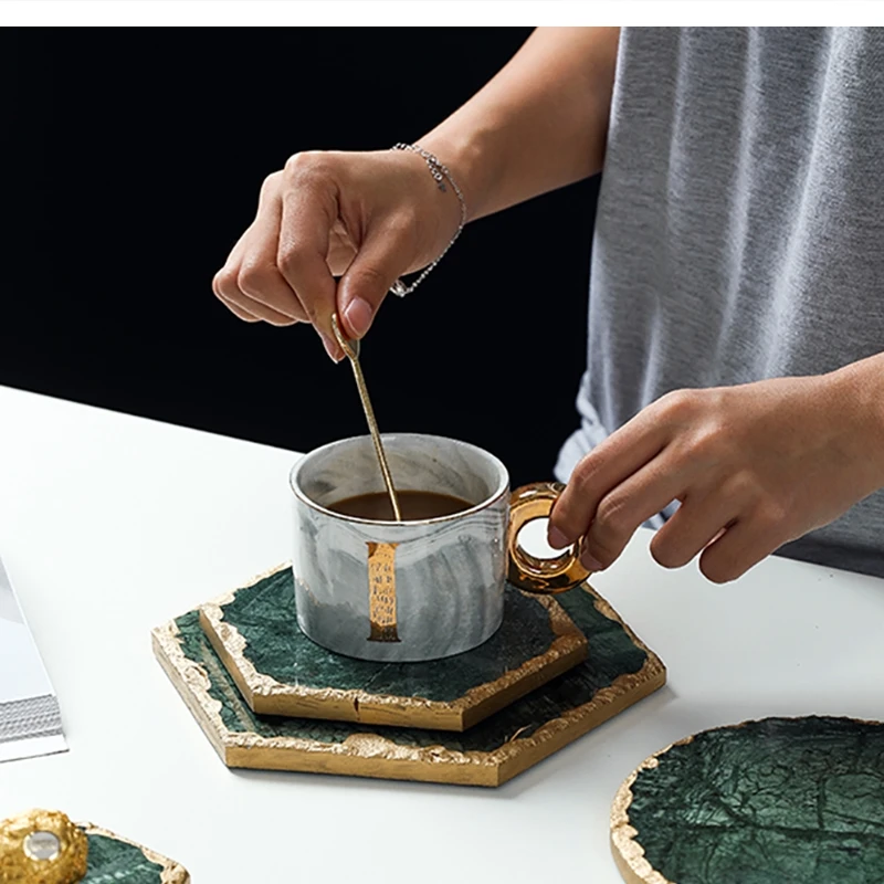 

Художественный изумрудный керамический стол, минималистичный обеденный офис, изоляционный коврик в Пномпене, кухонные принадлежности