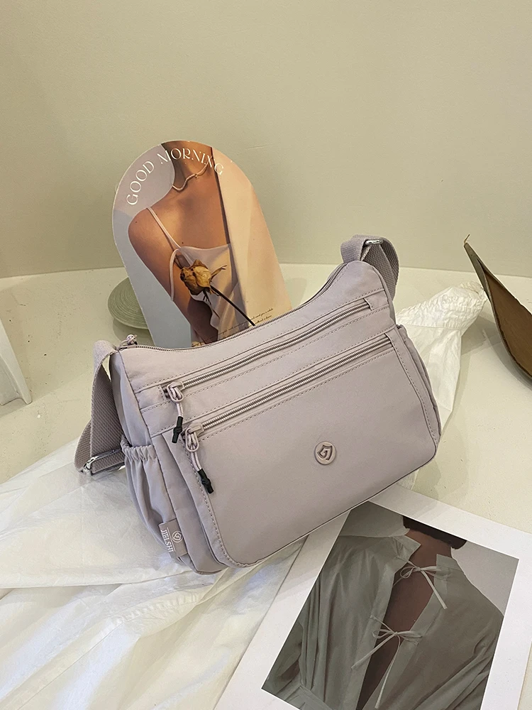 

Легкая нейлоновая повседневная сумка через плечо Jielangixing для женщин, вместительная универсальная сумка для мобильного телефона, на одно плечо, Sla...