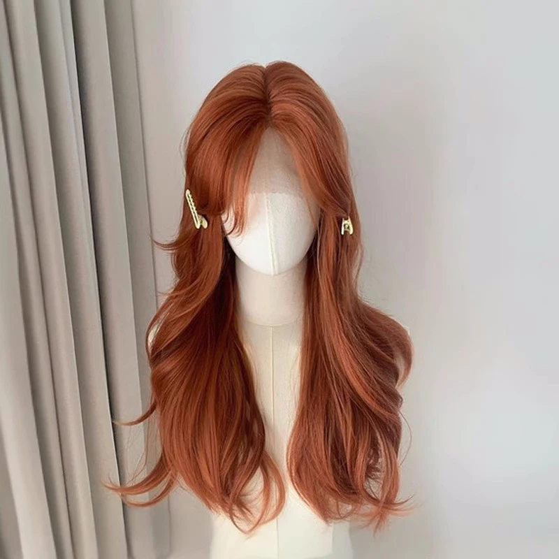 

Dirty orange dopamine wig, lace on the forehead, big wavy hair, long hair, and a full set of bangs