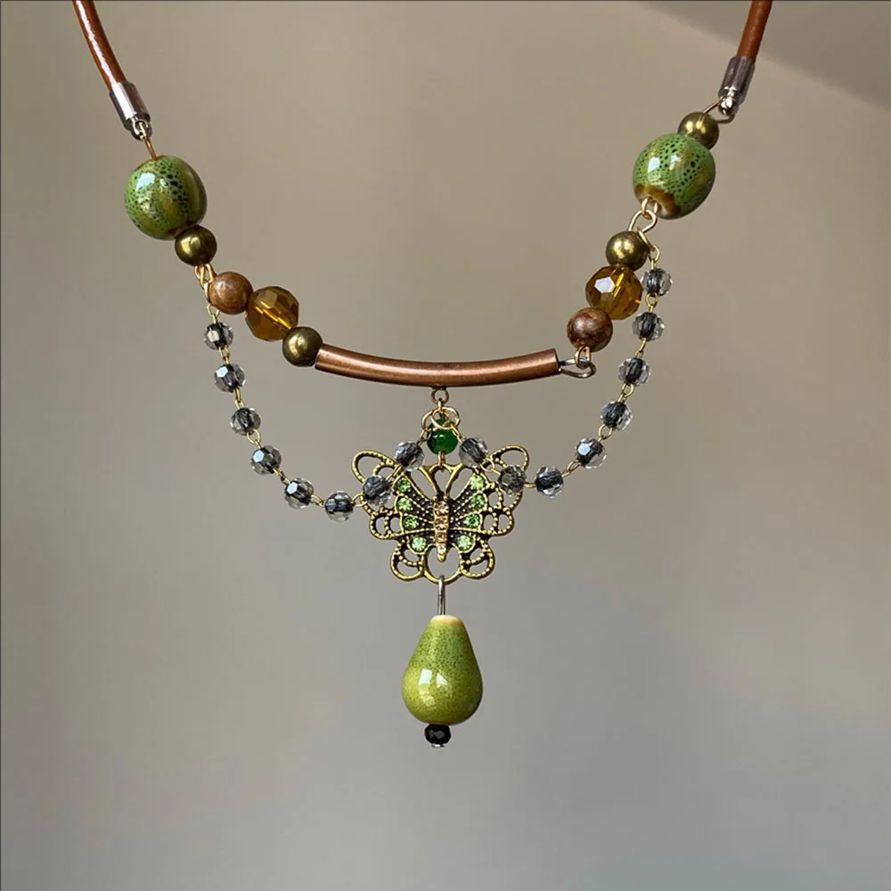 

Retro Crystal-encrusted Leather Rope Ceramic Butterfly Pendant Necklace Niche Design Sense Collarbone Chain For Women