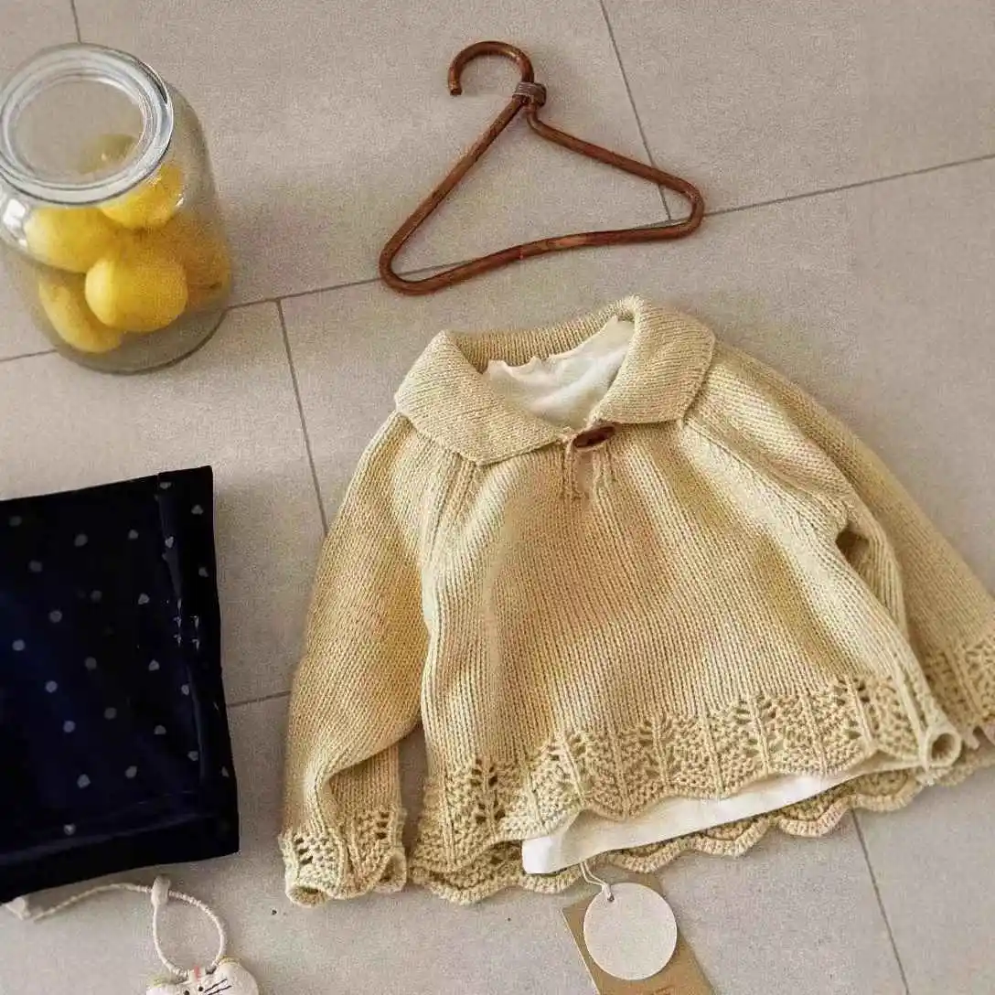 Spring and Autumn New Korean Girls' Long Sleeve Hollow Sweater Sweet, Versatile, High End Knitted Top for Little Girls