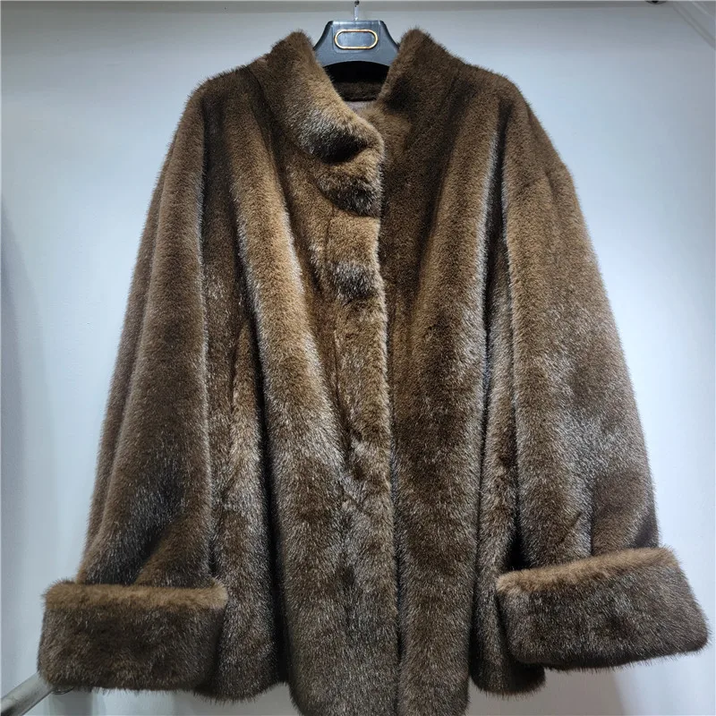 

Luxurious Midi-Length Faux Fur Coat. Features a sophisticated stand collar and turn-up cuffs for timeless, versatile style.