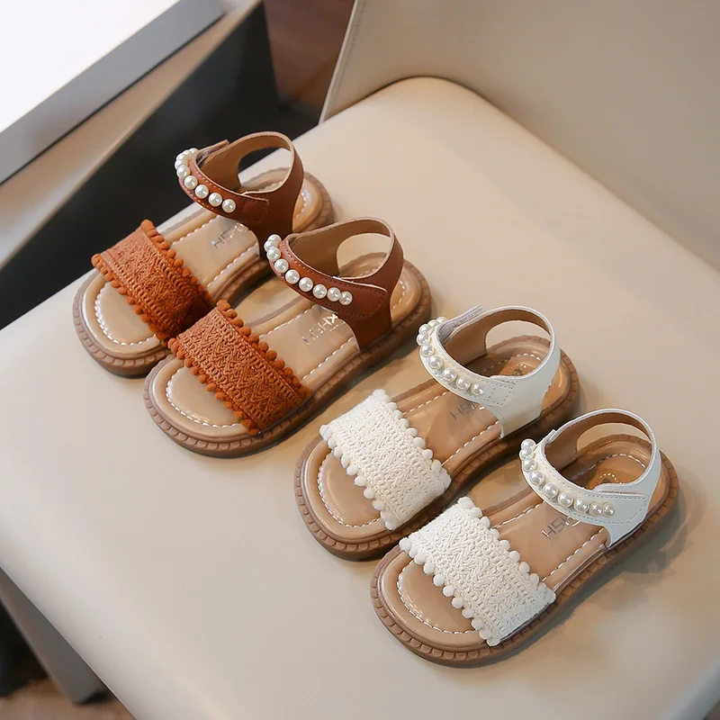 

Летние новые повседневные пляжные туфли 2026 года в корейском стиле с жемчугом, дышащие и универсальные сандалии, простые детские туфли, размеры 22-31