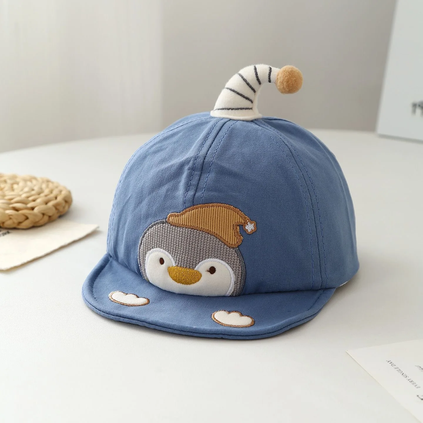 Children's embroidered little penguin with curved beak and fluffy balls on the hat, decorative soft brimmed baseball cap