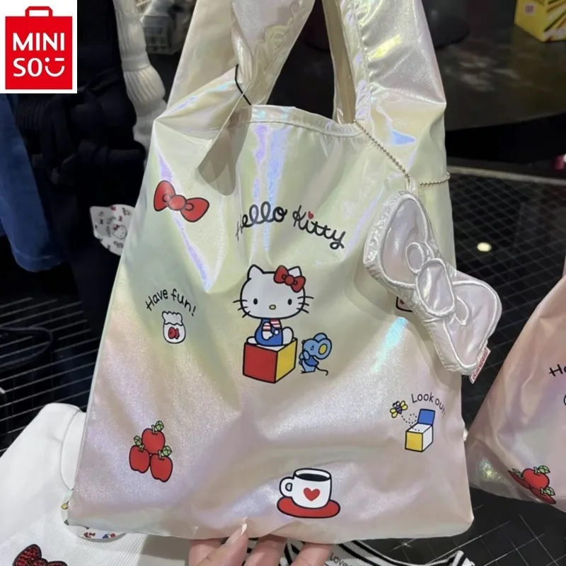 

MINISO 2024 New Cartoon Hello Kitty Laser Bow Pendant Foldable Shopping Bag Women's Cute Versatile Portable Storage Bag