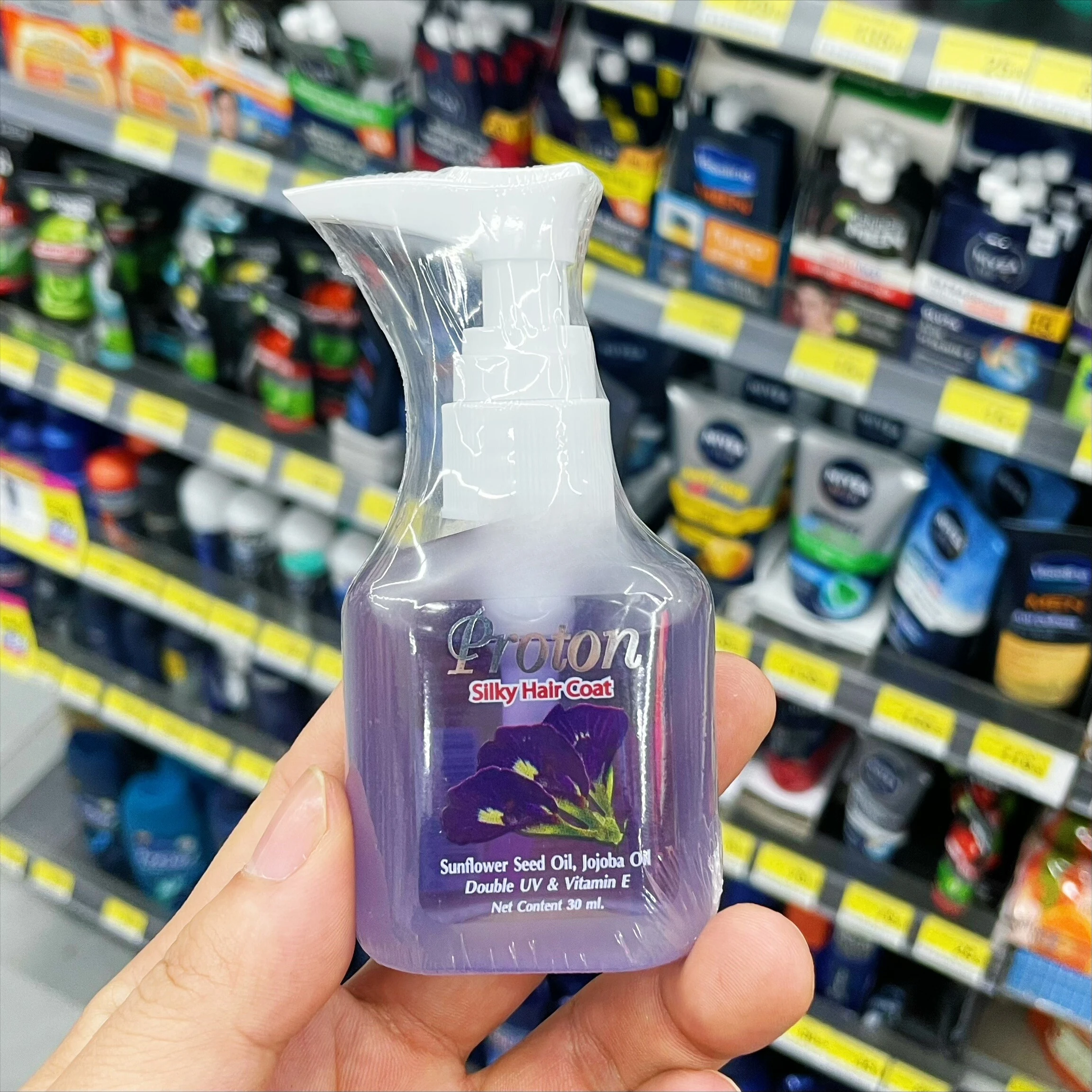 

Thai PROTON Butterfly Pea Hair Oil 30ml, Nourishes & Hydrates Hair Ends, Lightweight & Smoothing Formula