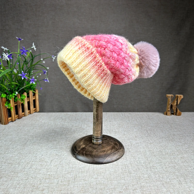 2024 main promotion mohair coarse needle mixed color knitted hat with plush fake wool ball for warmth and ear protection