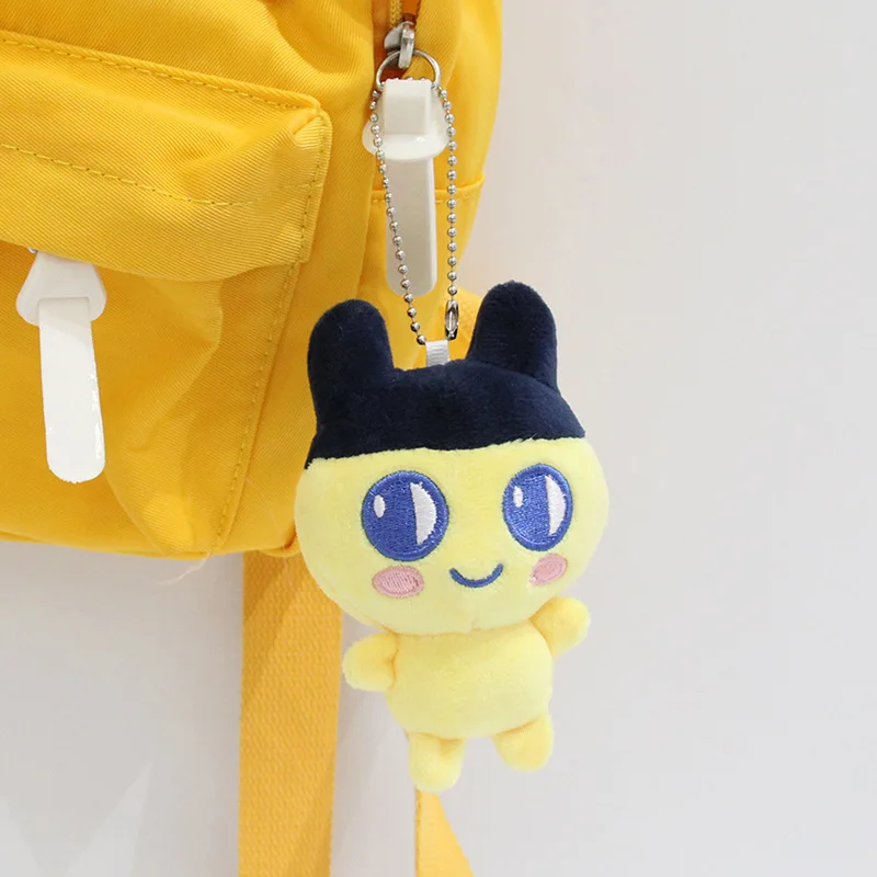 ญี่ปุ่น Tamagotchi Plush Soft เติมจี้ของเล่นสัตว์เลี้ยงอิเล็กทรอนิกส์ Mametchi Creative Key Buckle กระเป๋าเป้สะพายหลังการ์ตูนซิปตกแต่ง