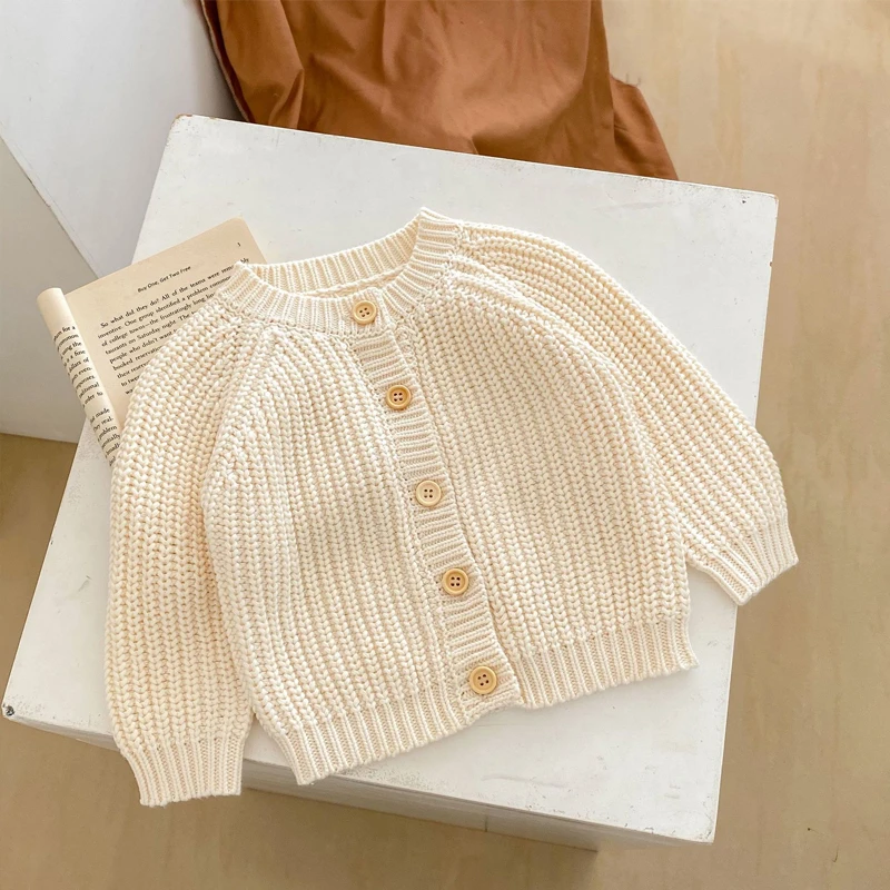 New autumn baby clothing, 0-3 year old girls and children\'s beige knitted long sleeved jacket, cardigan sweater