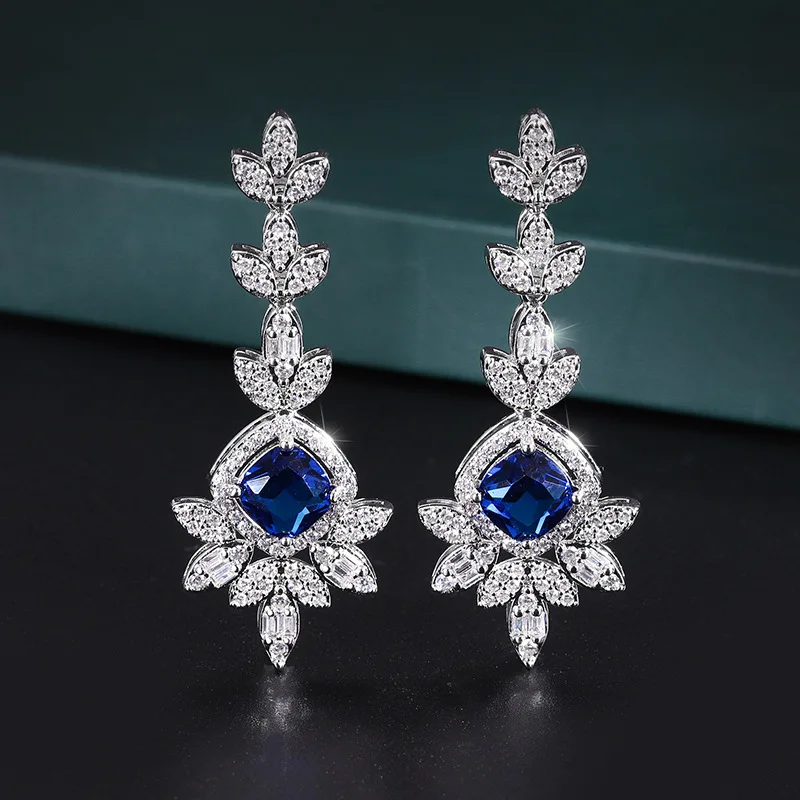 New High-end Jewelry Luxury Inlaid Copper Plated Real Gold Wind Blue Spindle Pendant Earrings Women's Set Main Stone 8*8