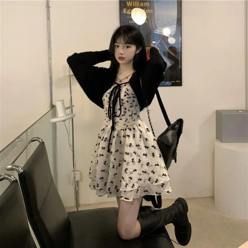 2022 new hot suspenders girl dress women's summer design sense small sun protection cardigan jacket two-piece set