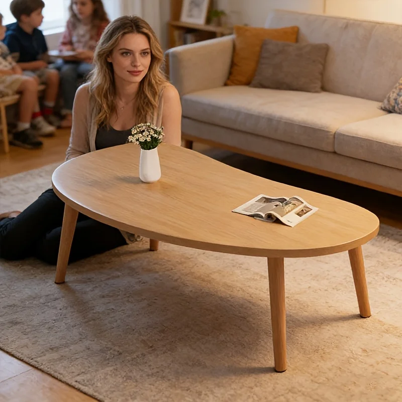 Natural Wood Grain Oval Coffee Table, Irregular Solid Wood Top Shows Unique Beauty. Slim Legs Create Lightweight Visual