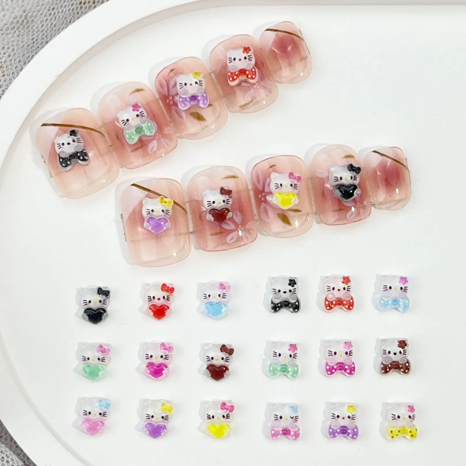 

100Pcs Mini Hello Kitty Nail Charms Cute Bow & Heart Resin Nail Decor Adorable 3D Cartoon Nail Art Accessories for DIY Manicures