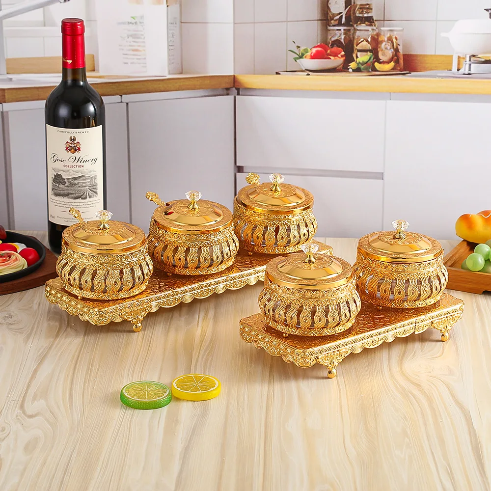 

Grid seasoning jar Hollow exquisite pattern gold seasoning bottle Household kitchen with lid set Storage jar