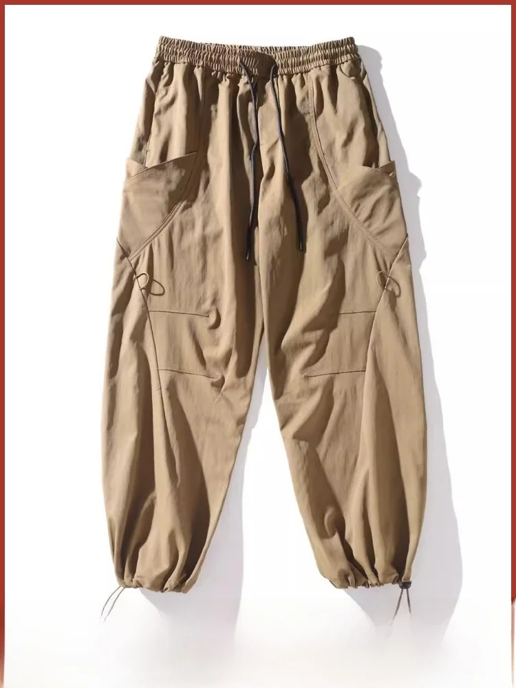 

Уличные мужские повседневные брюки свободного покроя Брюки с эластичной резинкой на талии Длинные брюки с регулируемой манжетой Легкие удобные брюки из полиэстера...