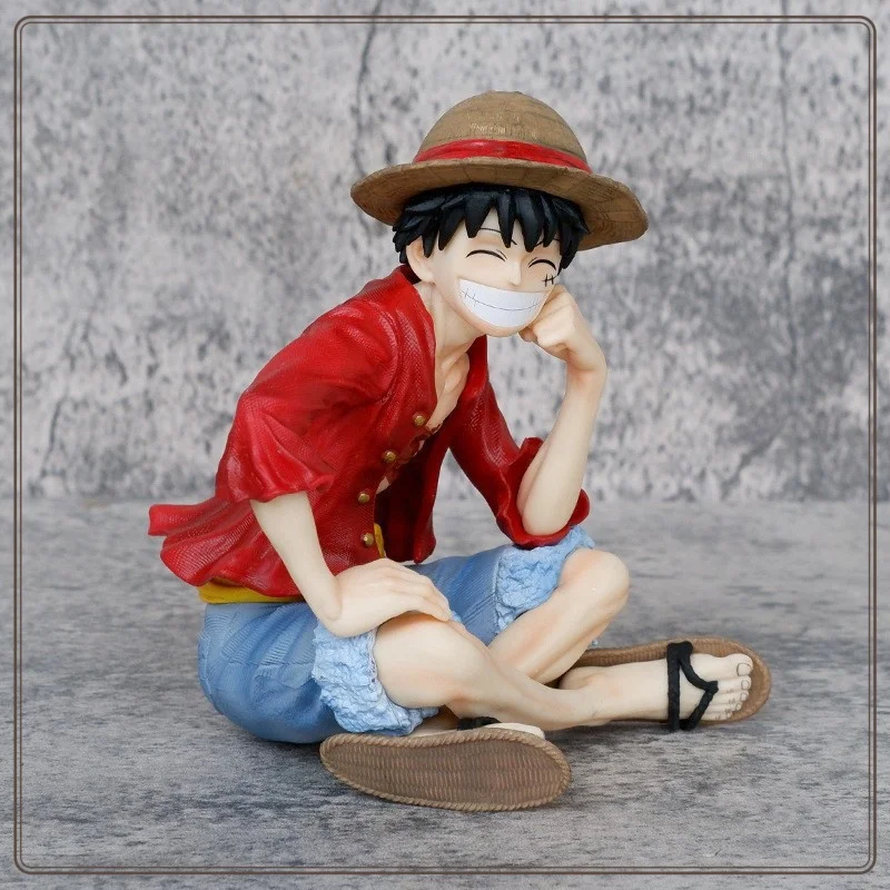 13CM One Piece Figure IU Sitting Luffy Smiling Face Holding Hands One Piece Straw Hat Luffy Animation Model Desktop Ornament