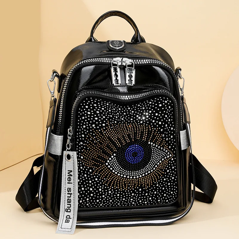 

PU leather hot diamond backpack for women, big eyes, waterproof, large capacity single-shoulder backpack