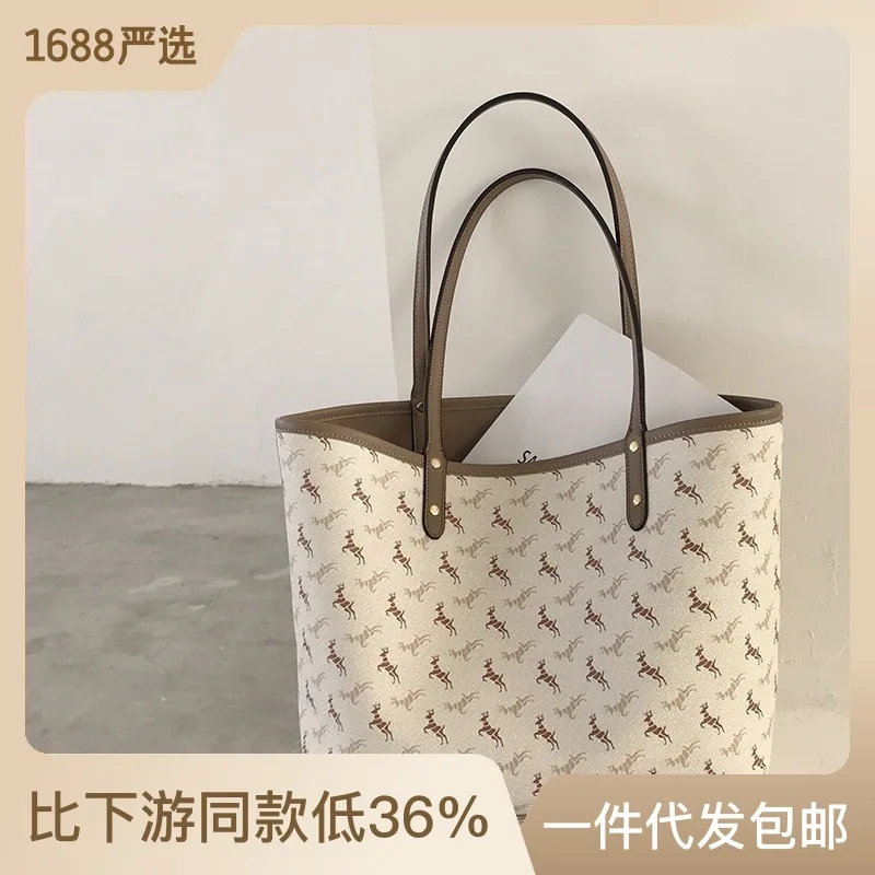 

One-shoulder bag female 2023 new wave online celebrity fashion printing pony Tote bag Joker large capacity bag.