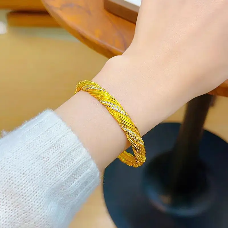 

Women's 24K Gold (AU999) Twisted Starlight Bracelet | Openwork twist pattern, micro-diamond glow with magnetic closure