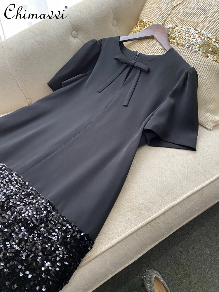 Station européenne été nouveau haut de gamme léger luxe célébrité tempérament nœud ample robe courte lourd paillettes fête robe droite