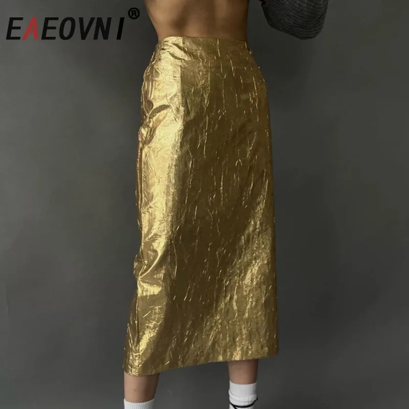 EAEOVNI 2026 printemps nouvelle jupe femme plis conception couleur unie fendu élégant jupe longue vêtements de sport