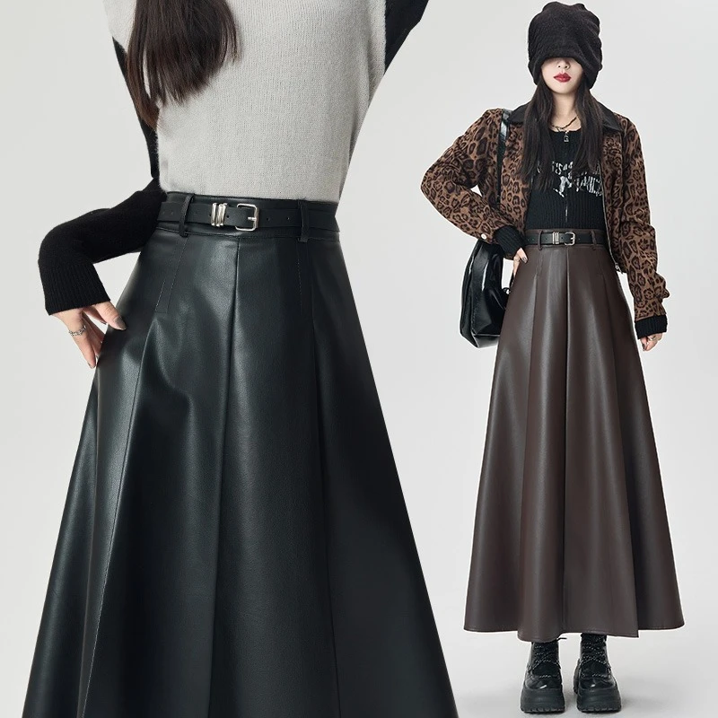 الخريف الشتاء عالية الخصر الأسود بولي Leather جلد المرأة مظلة تنورة طويلة مع مربوط 2025 جديد خمر مستقيم ألف خط التنانير الإناث
