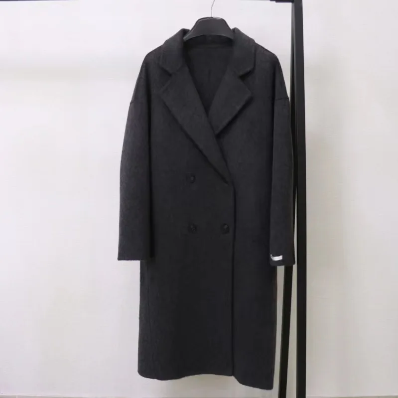 2025 Cappotto di lana con petto abbassato da donna primaverile Cappotto invernale in cashmere stile sciolto Cappotti lunghi Top Nuovo